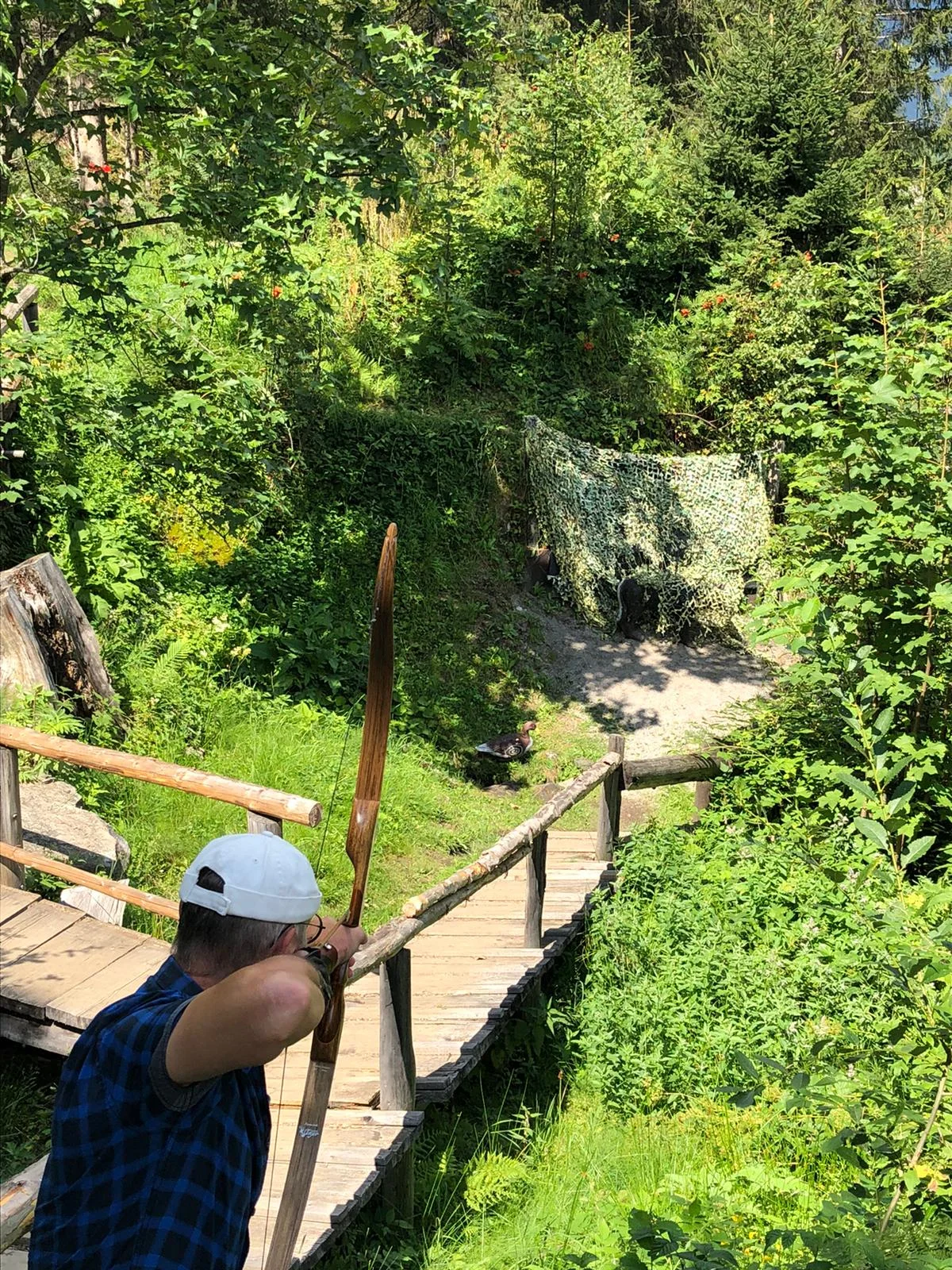 Bogenschütze beim Spannen